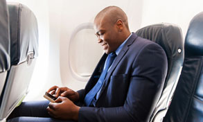 man on plane with mobile device, Xerox, Connect Key, Advanced Business Solutions, Xerox, Lexmark, HP, Copier, Printer, MFP, Florida, FL